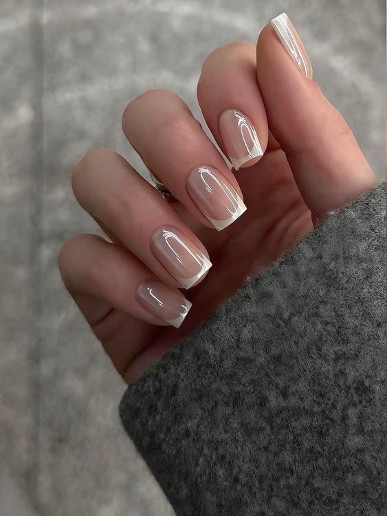 Electric file with a fine bit removing cuticle tissue during a Russian dry manicure